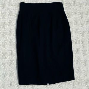 Well tailored black pencil skirt.